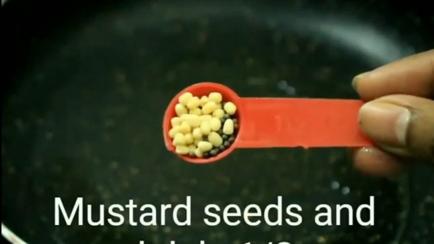 Add oil, mustard seeds and black gram